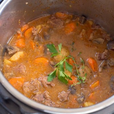 No need to have a big pot of beef stew simmering all day when you can have Instant Pot Beef Stew ready in 45 minutes!  The beef is so tender it just falls apart and melts in your mouth - my favorite.  