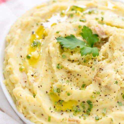 Instant Pot Mashed Potatoes are a time saver and made in about 8 minutes! They come out perfectly creamy, light, and fluffy every single time! 