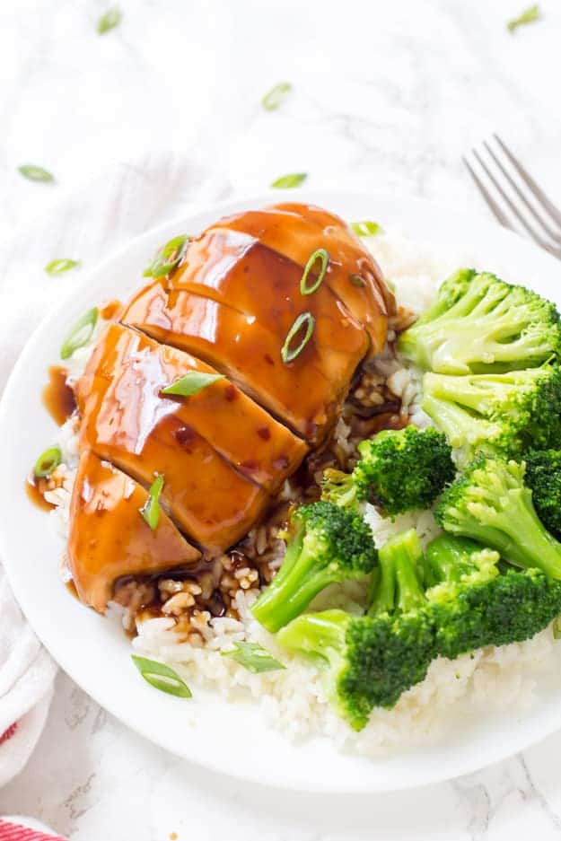This Easy Baked Teriyaki Chicken is the perfect weeknight meal! Juicy and tender chicken breasts are baked in this incredible homemade teriyaki sauce. So simple and incredibly flavorful! 